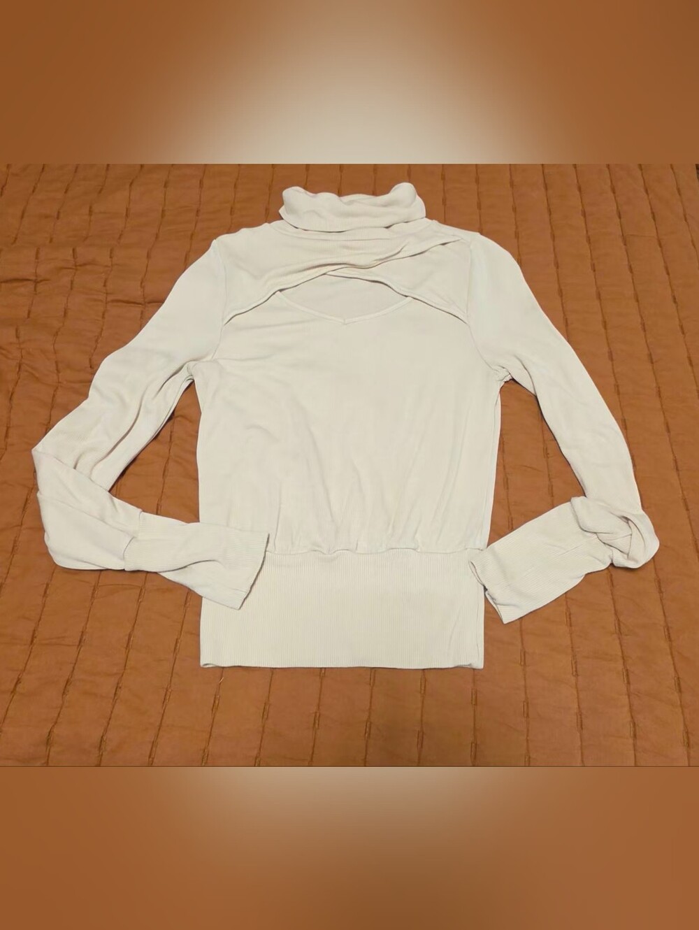 Cutout Turtleneck Long-Sleeve Top in Cream